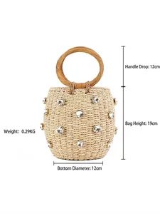 Beige woven cylinder tote bag with sparkling rhinestones and round wooden handle