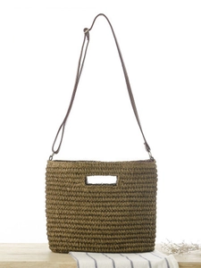 Brown woven paper straw shoulder bag with leather strap for summer beach vacations