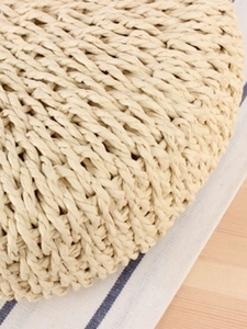 Minimalist cream woven semicircular beach bag with natural fiber texture and handwoven detail