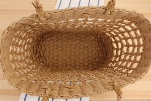 Vertical top view of large capacity hollow woven paper rope bag with detailed inner structure