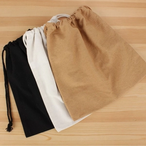 Canvas drawstring inner bag accessory in black, white, and khaki for woven bags