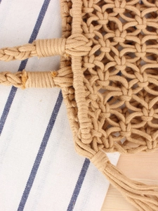 Handmade woven cotton rope shoulder bag featuring hollow floral mesh pattern in natural beige