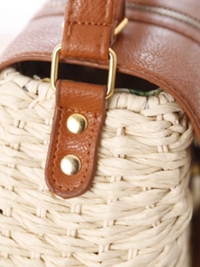 Borsa tote in paglia intrecciata con finiture in pelle marrone e fodera floreale
