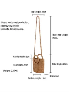 Handwoven straw shoulder bag with ring handles and dimensions for beach vacations