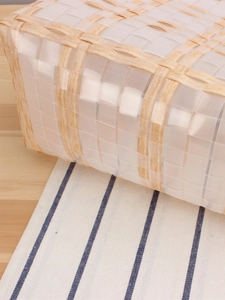 Handwoven waterproof plastic beach tote with white and wood-grain pattern grid design