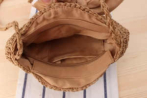 Detail view of woven bag interior with durable zipper pocket and soft lining