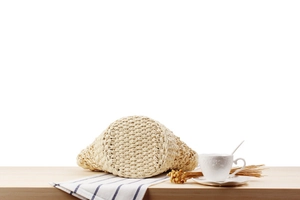 Close-up of a round-bottomed woven paper rope bag featuring detailed handmade texture