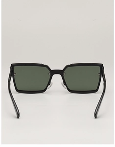 Close-up of the stylish hollow-out temples and bridge on square green lens sunglasses