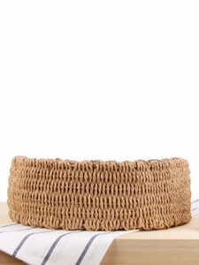 Handmade woven round straw bag with dual handles for summer beach and casual vacations