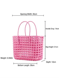 Pink woven PVC beach bag with dimensions 35x21x12cm featuring dual handles