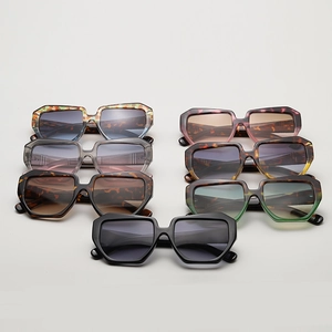 Detail showing seven color variants of oversized square sunglasses with metal stud accents