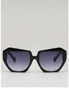Detailed view of oversized geometric black frame sunglasses with gradient purple lenses