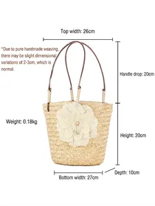 Handwoven straw beach handbag with large white flower detail and slim leather handles