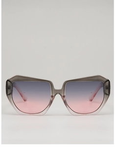 Detail of square oversized translucent grey frame and gradient blue-pink tinted lenses