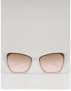 Detail of white thick-frame cat-eye sunglasses with pink to orange gradient lenses