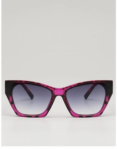 Detailed view of cat-eye sunglasses with rose-pink tortoise frame and gradient lenses