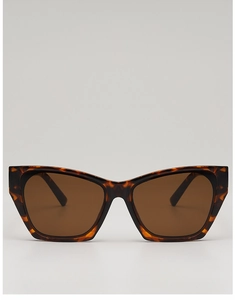 Detailed view of cat eye sunglasses with tortoise shell texture and brown lenses