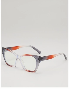 Side view of cat-eye sunglasses with transparent orange to grey gradient frame