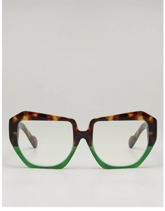 Detail of square sunglasses featuring tortoise shell upper and green lower frame contrast
