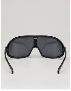 Rear view of sleek black cycling shield sunglasses showing inner frame and curve