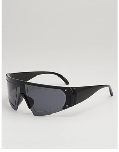 Macro detail of wide temple arms and seamless lens on futuristic black shield sunglasses