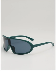 Close-up of dark green cycling sunglasses with a streamlined one-piece wrap-around frame