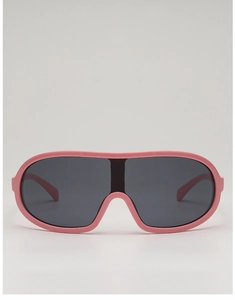 Close-up of pink oversized shield cycling sunglasses with dark polarized lenses