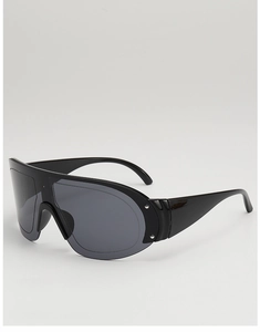 Detailed view of black shield sunglasses with wide temples and silver decorative rivets