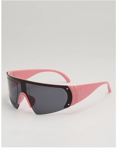 Detailed close-up of pink oversized shield sunglasses with Y2K sporty aesthetic