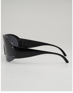 Side view of sleek black oversized sports sunglasses with thick temples and future style