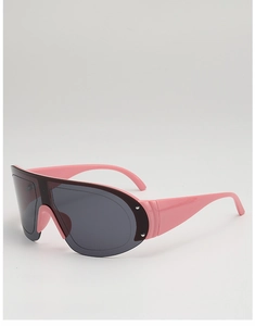 Close-up of pink oversized frame sports sunglasses with dark grey one-piece shield lens