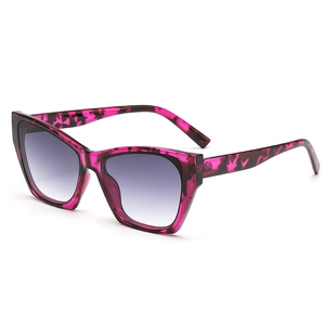 Cat eye sunglasses with purple gradient lenses and red tortoiseshell frame for women