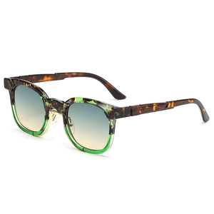 Lunettes de soleil léopard tendance avec accents verts et verres dégradés bleus