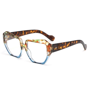 Chunky rectangular sunglasses with tortoiseshell and teal contrast frame from a 45-degree angle