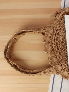 Handmade woven paper rope shoulder bag with hollow round design and scalloped edges