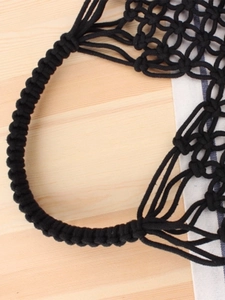 Handmade black macrame hollow out woven shoulder bag with detailed knotting craft