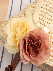 Handmade straw beach bag with floral decor and pearl ribbon detail for women
