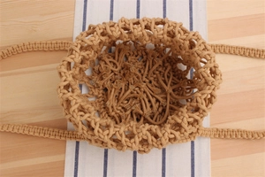 Detail view showing the spacious interior and hollow mesh weave of a cotton crochet tote bag