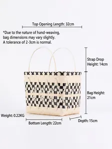 Handwoven basket bag with black and beige geometric patterns and dual handles for picnic