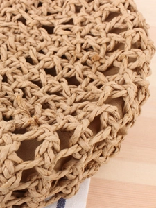 Handmade woven hollow semi-circle shoulder bag with beige lining for beach vacation