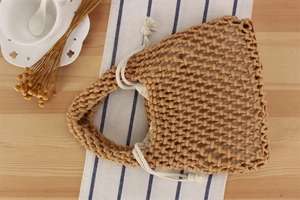 Detail of handmade hollow woven cotton rope bag with a practical drawstring inner liner