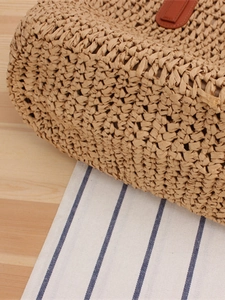 Hollow woven paper rope shoulder bag with brown leather clasp for summer beach casual style