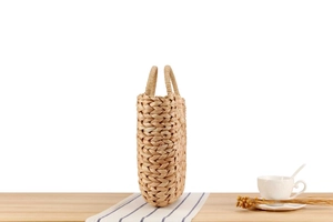 Detail of the thick texture and sturdy handles on this large handmade corn skin woven tote bag
