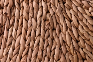 Macro detail of natural hand-woven corn husk texture on large beach basket tote