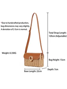 Handmade woven straw crossbody bag with brown leather flap and adjustable strap
