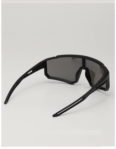 Close-up of matte black frame and large shield lens for kids sports cycling sunglasses