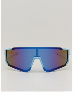 Macro detail of kids cycling sunglasses with blue-purple gradient lens and blue frame