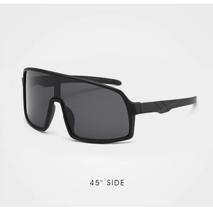 45-degree side view of matte black kids cycling goggles with high-quality dark grey lenses