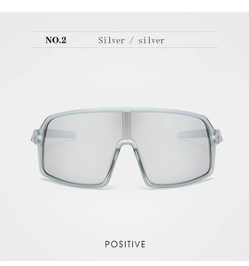 Front view of kids cycling sunglasses with silver mirrored lens and translucent blue frame