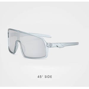 Detail view showing the 45-degree side profile of light gray cycling glasses for kids